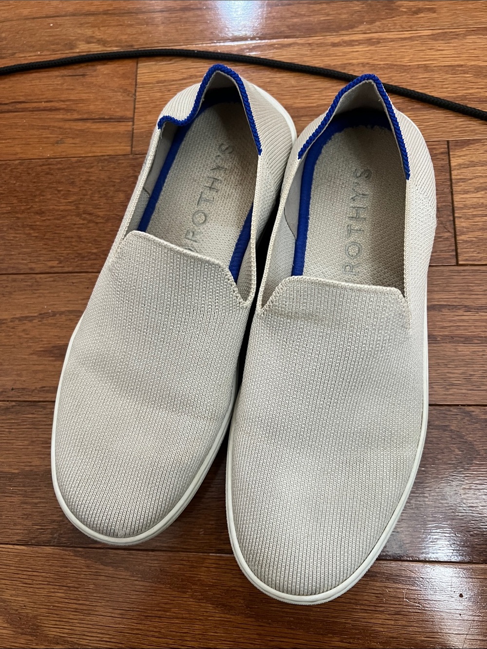 Rothy's Cream Knit Slip-Ons with Blue Collar
